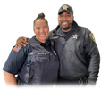 an image of two correctional officers, both male and female