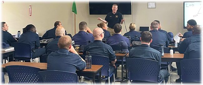 an image of the Sheriff speaking to new recruits